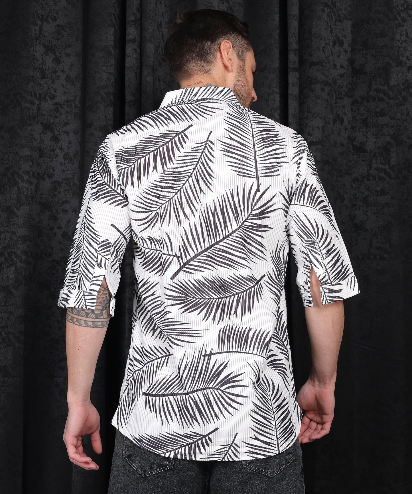 Lionies Black Leaves Printed Half Sleeves Shirt for Men, made from premium 100% cotton with a 210 GSM weave, featuring a sophisticated white leaves print, half sleeves, and a stylish design for casual and semi-formal occasions.