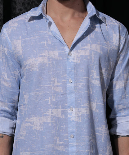 Premium Blue Printed Occasion Shirt by Lionies for Men, featuring a vibrant bright blue color with captivating print, crafted from soft cotton fabric, full sleeves, smart collar, and tailored fit for stylish casual and special events.